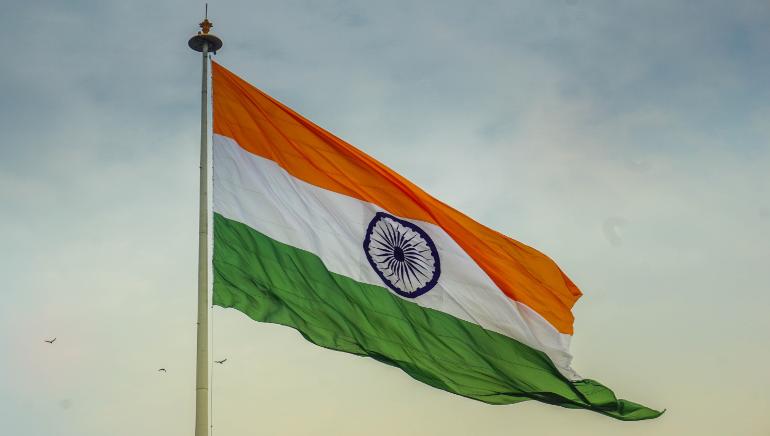 India Flag on Blue Sky
