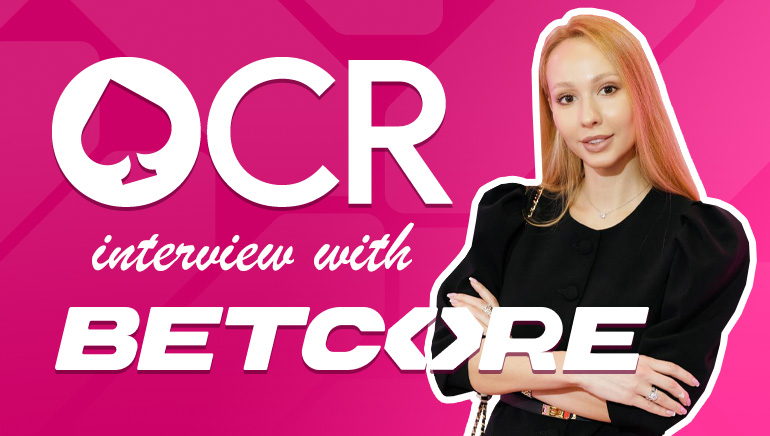 Picture of BETCORE marketing manager Valeriia with OCR and BETCORE logos