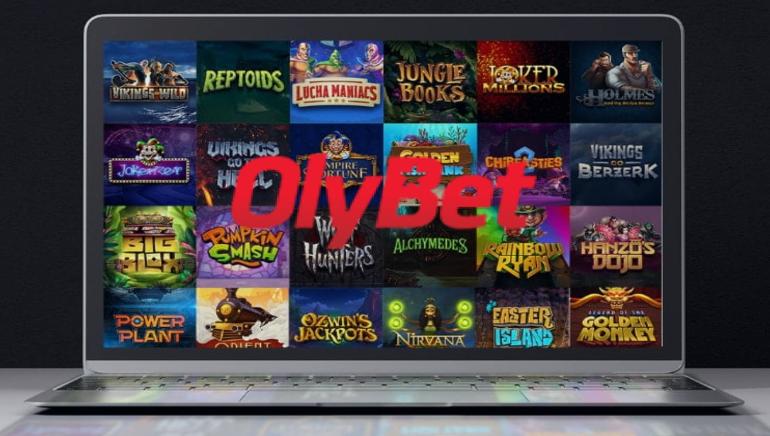 Olybet Casino Logo and laptop showing Yggdrasil casino games