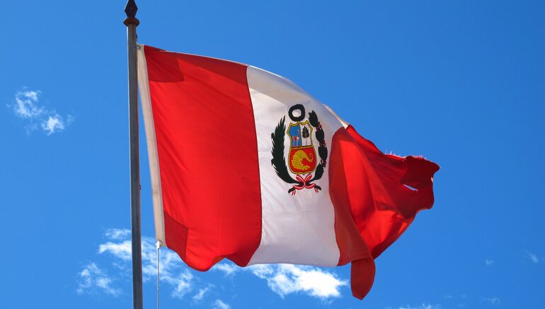 Peru Flag on clear sky background